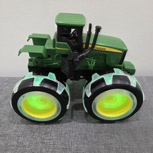 John Deere Green Toy Tractor with Glowing Wheels